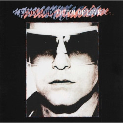 Elton John • Victim of Love