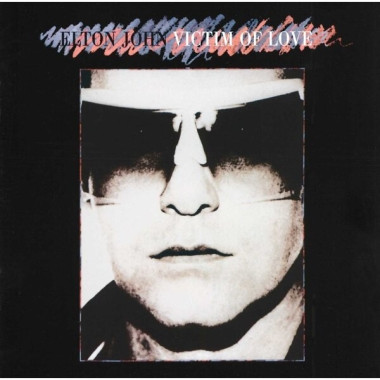 Elton John • Victim of Love