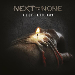 Next To None • A Light In The Dark